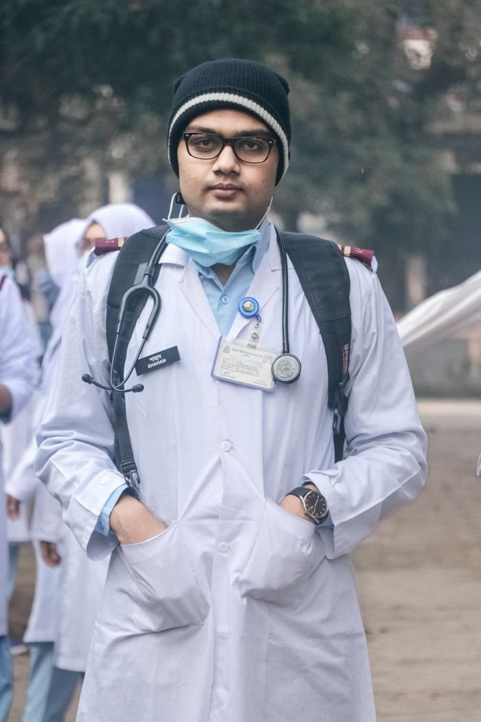 cta-01 A young medical professional with stethoscope outdoors in winter clothing.
