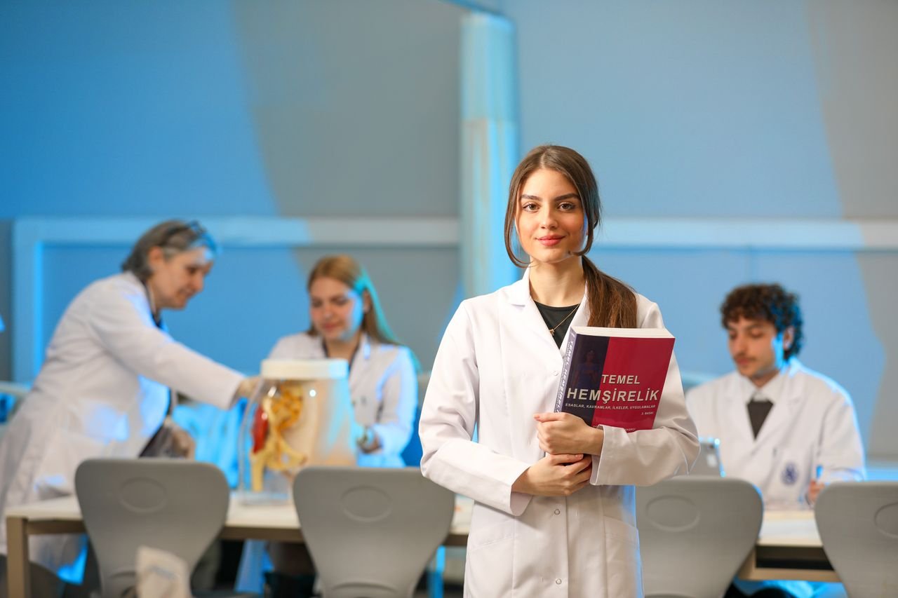 about-img Young nursing students engaging in lab study, showcasing medical education.